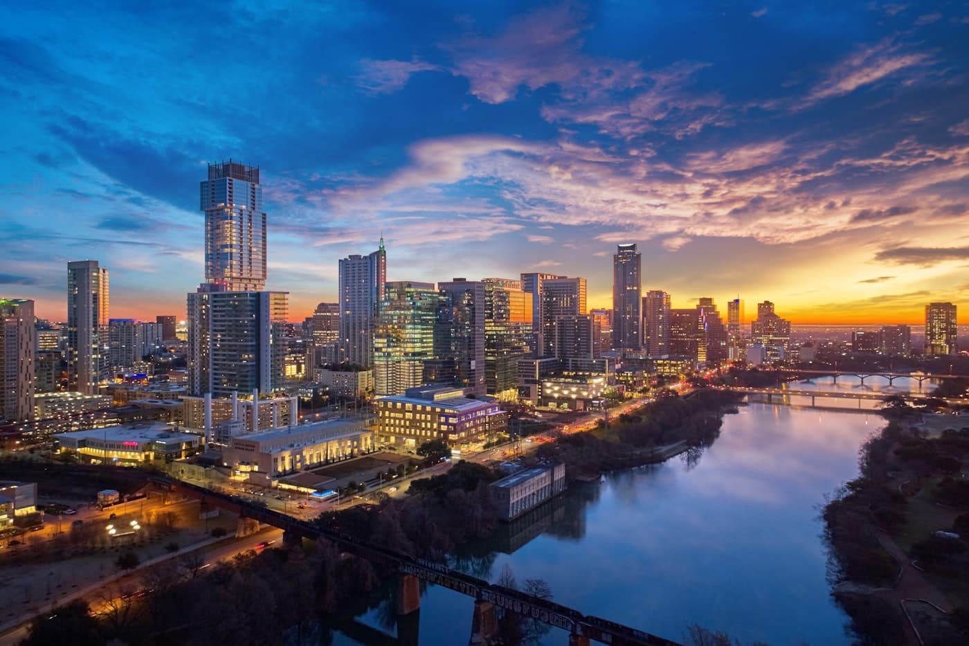 Downtown Austin, Texas at dusk, seen across Lady Bird Lake